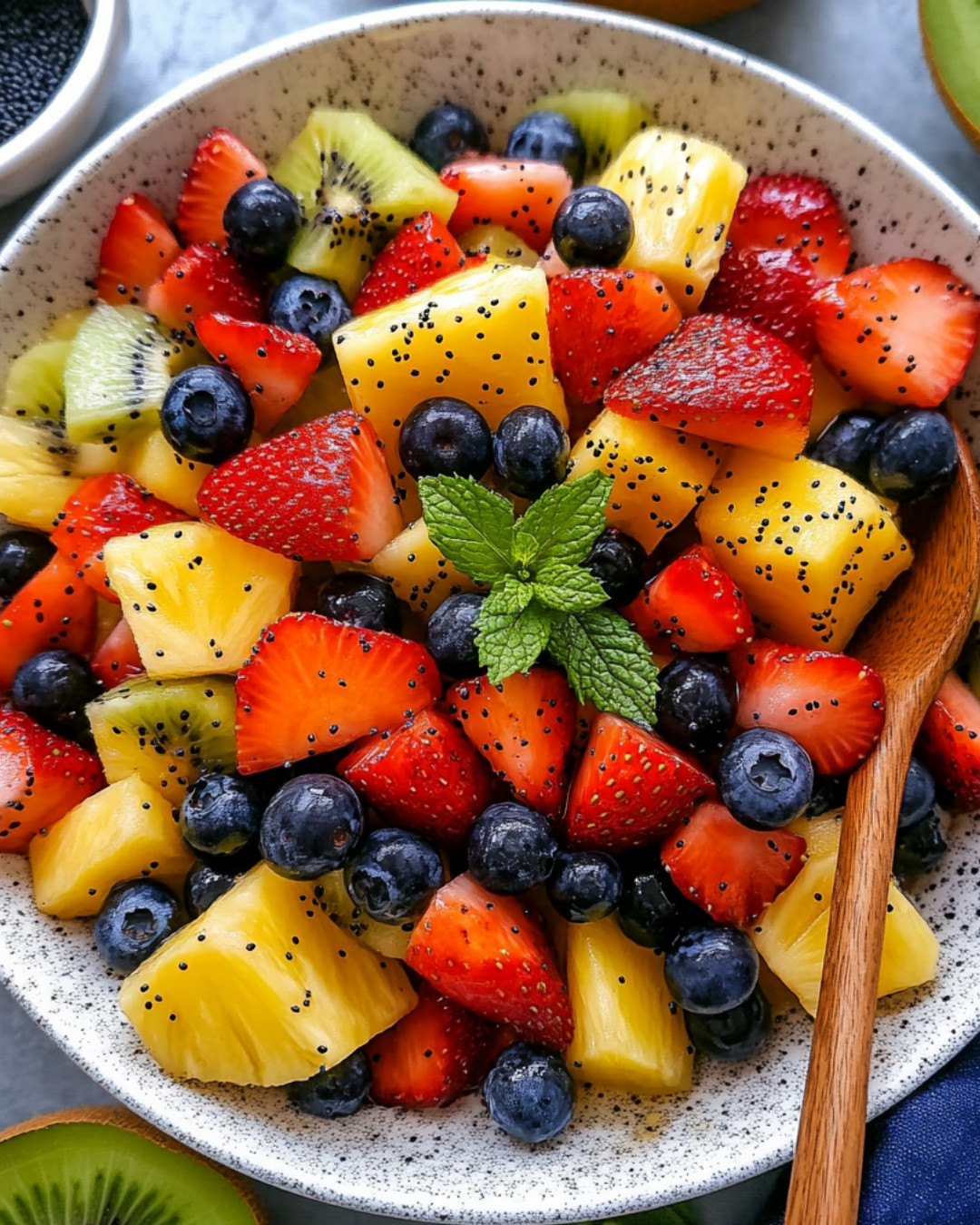 fresh-fruit-salad-with-delightful-honey-lime-poppy-seed-dressing.webp