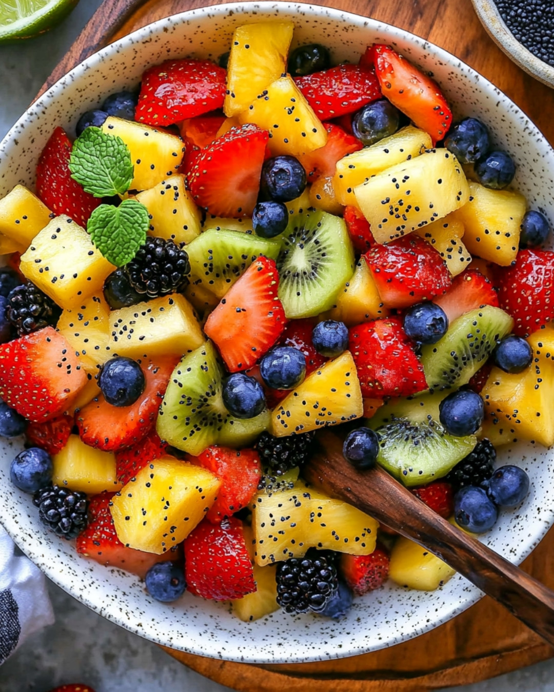 fresh-fruit-salad-with-delightful-honey-lime-poppy-seed-dressing.webp